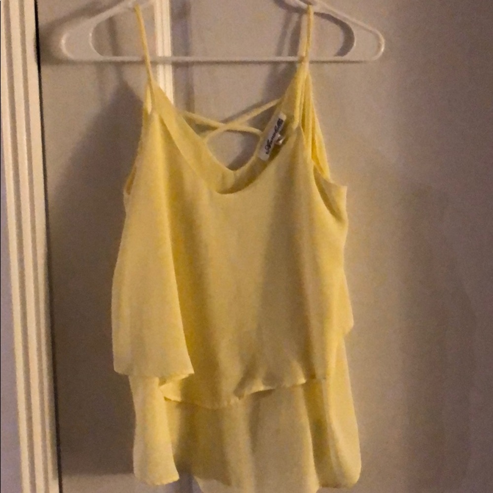 Yellow cami with criss-cross detailing on back